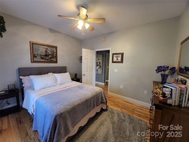 660 Scoggins Rd, Rutherfordton, NC 28139 - bedroom featuring light wood finished floors, baseboards, and a ceiling fan
