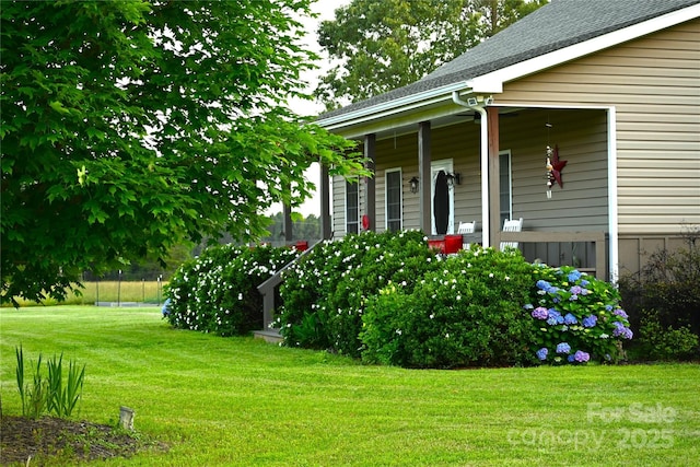 660 Scoggins Rd, Rutherfordton, NC 28139 - view of grassy yard with covered porch