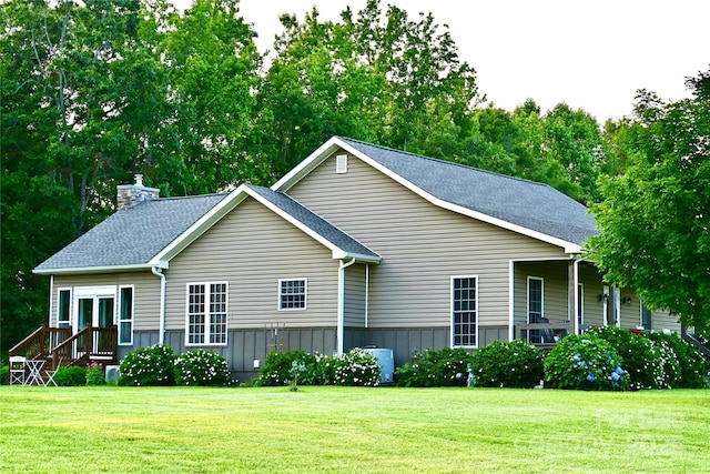 660 Scoggins Rd, Rutherfordton, NC 28139 - view of front facade featuring a front yard, a chimney, and a shingled roof