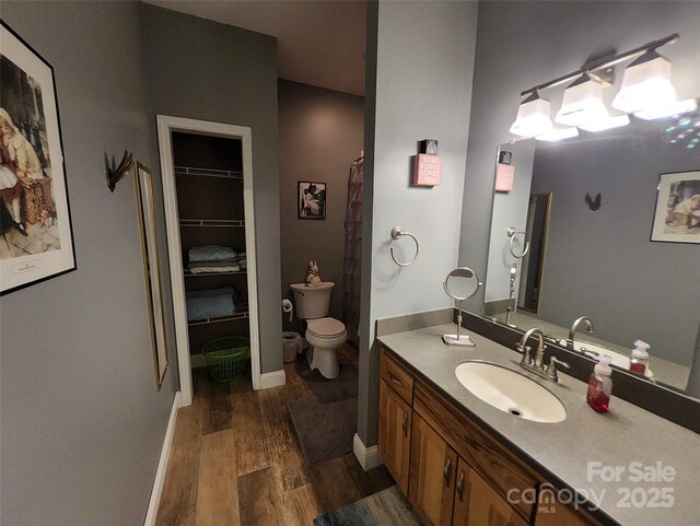 660 Scoggins Rd, Rutherfordton, NC 28139 - full bath featuring wood finished floors and vanity
