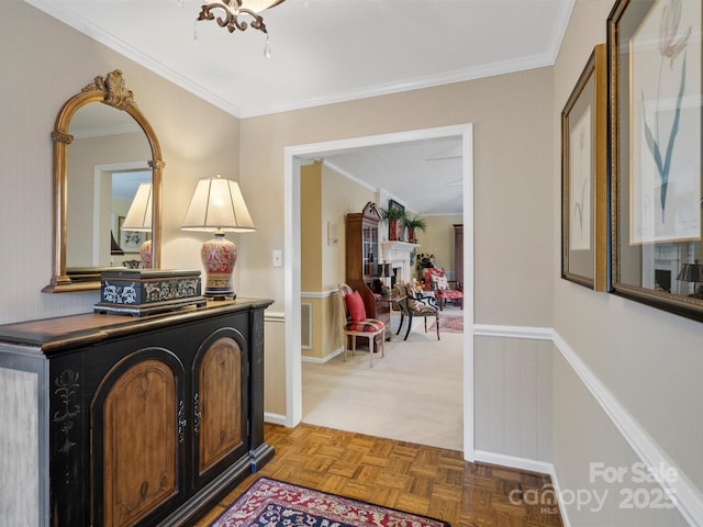 interior space featuring crown molding and parquet floors