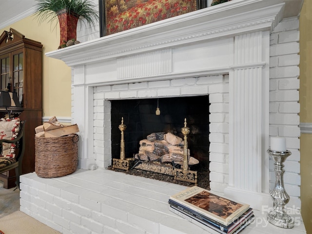 interior details with a brick fireplace