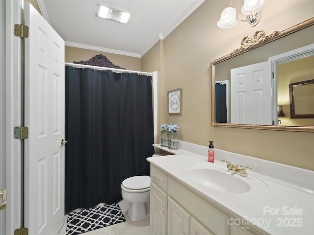 bathroom featuring vanity, tile patterned floors, ornamental molding, and toilet