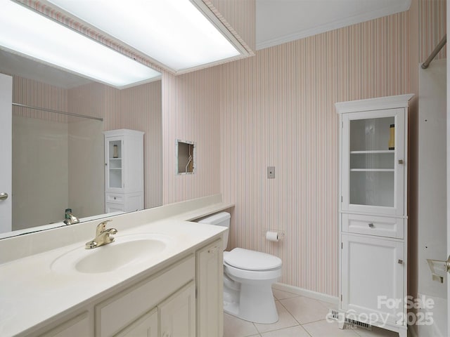 bathroom featuring tile patterned flooring, vanity, and toilet