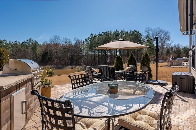 view of patio featuring grilling area and an outdoor kitchen