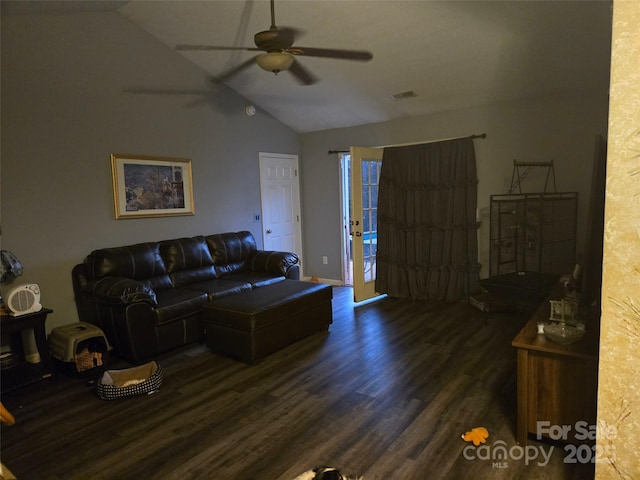 living room featuring ceiling fan, lofted ceiling, and dark hardwood / wood-style flooring