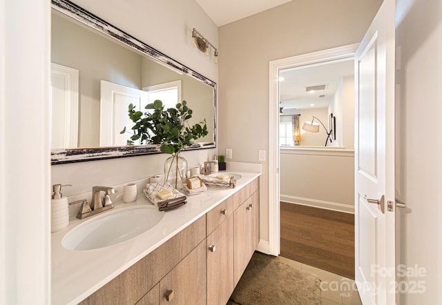 bathroom with vanity and tile patterned flooring