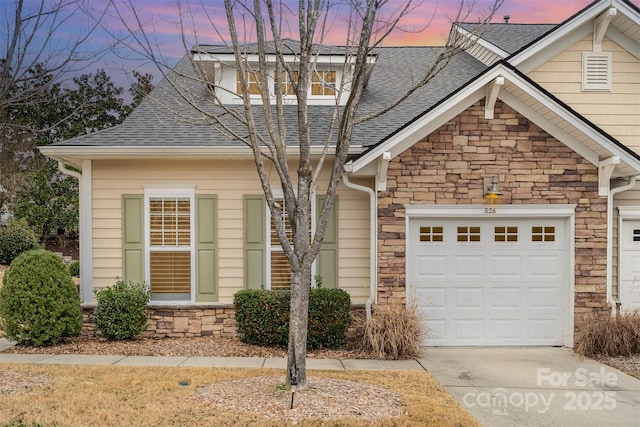 view of front property with a garage