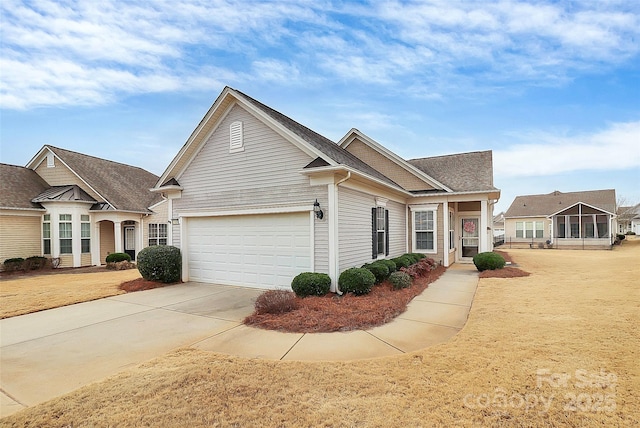 view of front of property with a garage