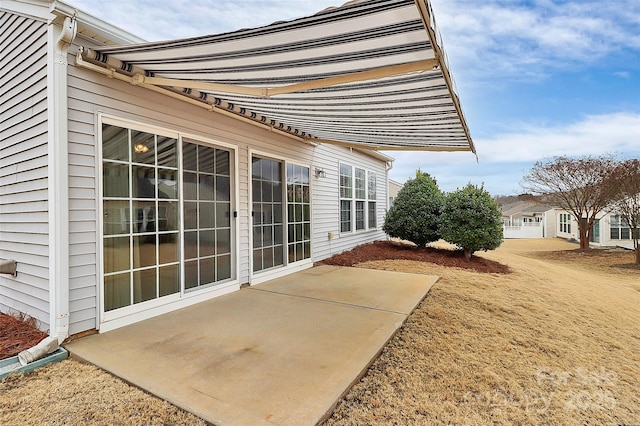 view of home's exterior featuring a patio area