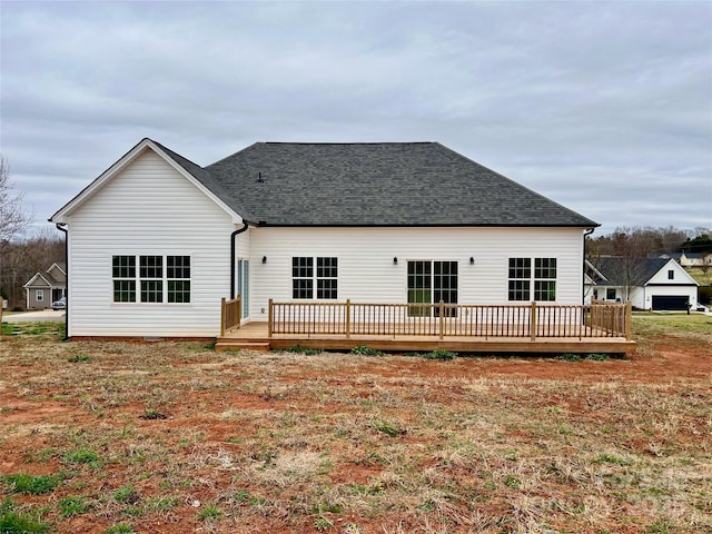rear view of property with a deck