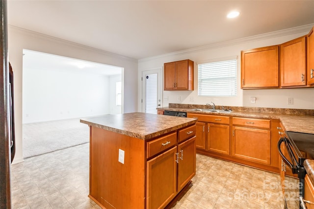 kitchen with sink, ornamental molding, black appliances, and a center island