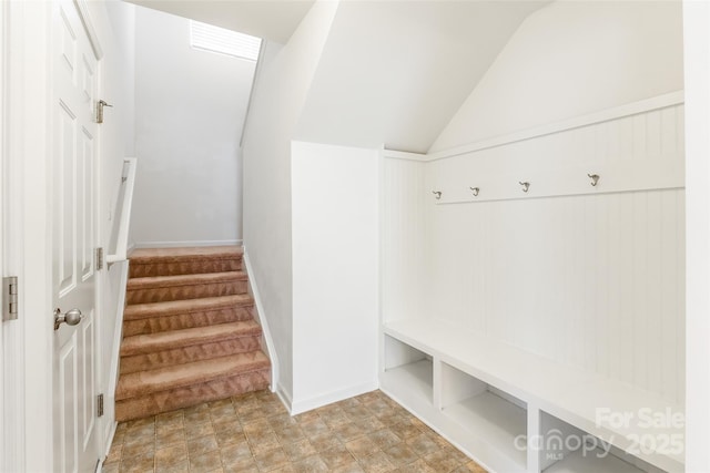 mudroom with vaulted ceiling