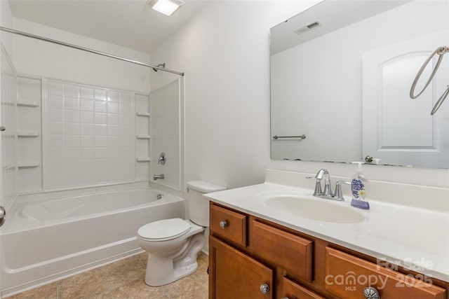 full bathroom with  shower combination, vanity, tile patterned floors, and toilet