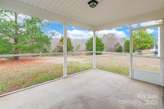 view of unfurnished sunroom