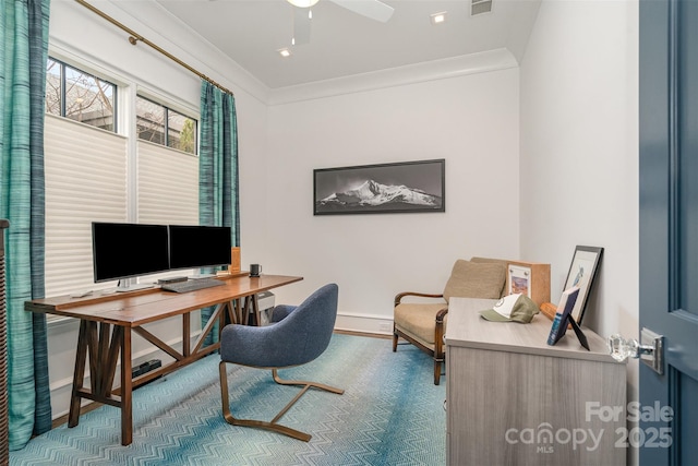 office featuring baseboards, ceiling fan, visible vents, and crown molding