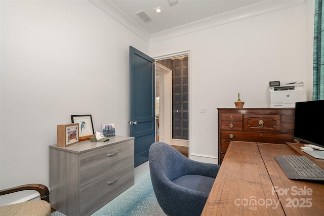 home office featuring baseboards, visible vents, and ornamental molding