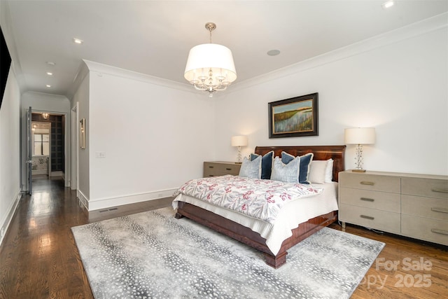 bedroom featuring crown molding, recessed lighting, wood finished floors, a chandelier, and baseboards