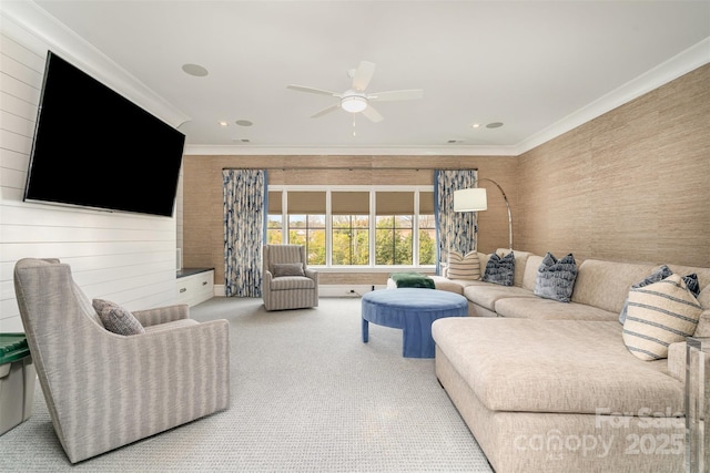 carpeted living room with ceiling fan, crown molding, and recessed lighting