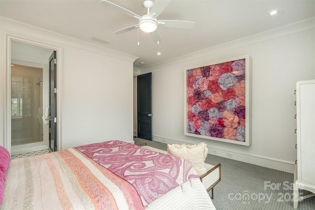 carpeted bedroom with ceiling fan, ensuite bathroom, visible vents, baseboards, and crown molding