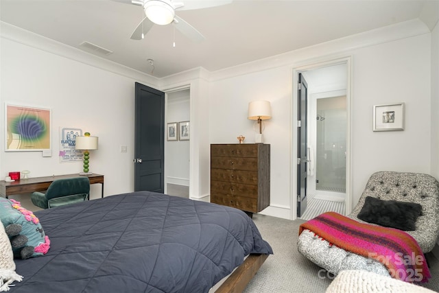 carpeted bedroom featuring crown molding, visible vents, a ceiling fan, connected bathroom, and baseboards