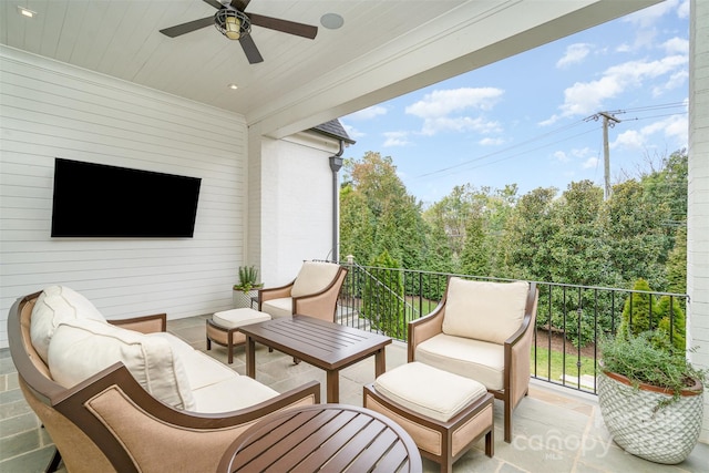 balcony with ceiling fan and outdoor lounge area