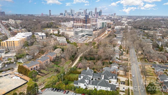 drone / aerial view featuring a city view