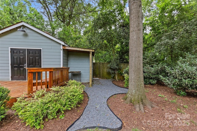 view of yard with a wooden deck