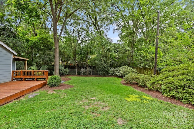 view of yard featuring a deck