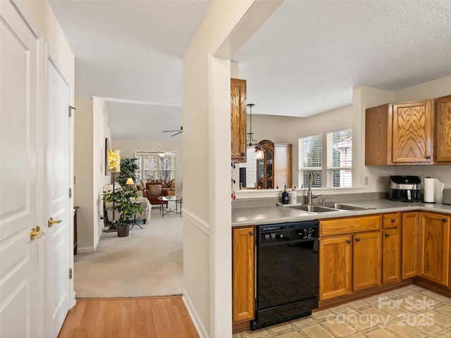 1206 Deermouse Way, Hendersonville, NC 28792 - kitchen with sink, dishwasher, ceiling fan, a textured ceiling, and light carpet