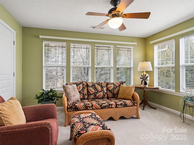 1206 Deermouse Way, Hendersonville, NC 28792 - carpeted living room with ceiling fan, a textured ceiling, and a wealth of natural light