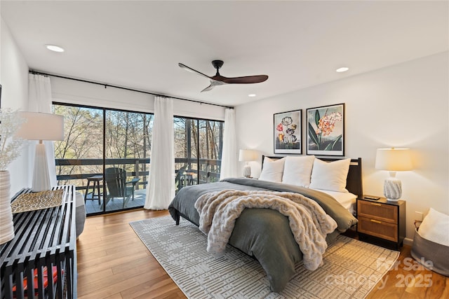 bedroom with ceiling fan, access to exterior, and light hardwood / wood-style flooring