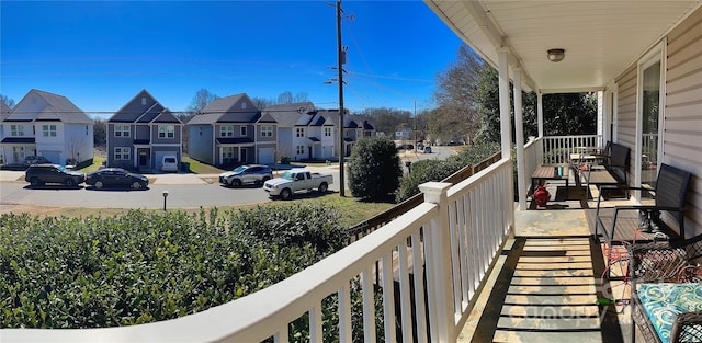 balcony featuring a residential view