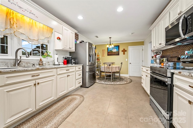 kitchen with stainless steel appliances, crown molding, sink, and white cabinets