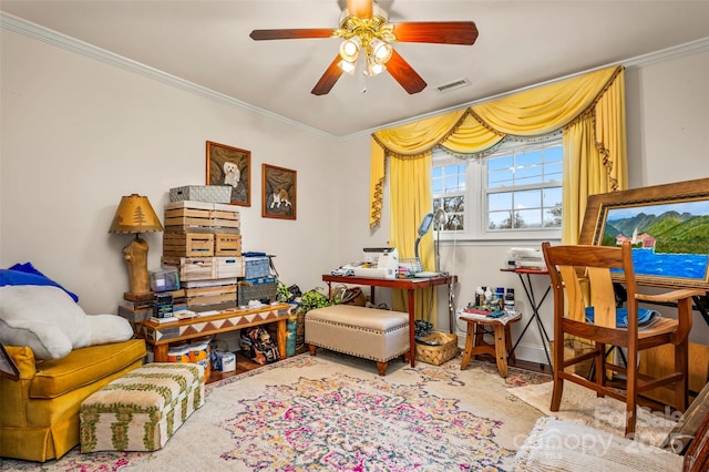 living area featuring hardwood / wood-style flooring, ornamental molding, and ceiling fan