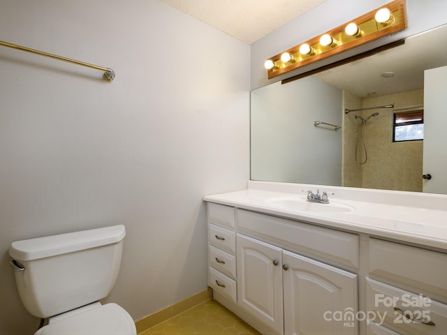 full bath featuring walk in shower, vanity, toilet, and tile patterned floors