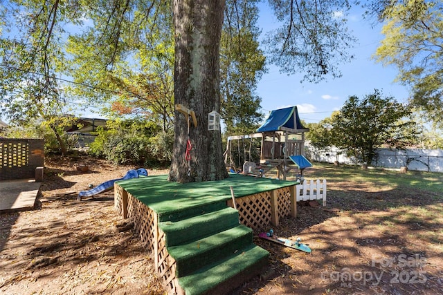 view of yard featuring a playground