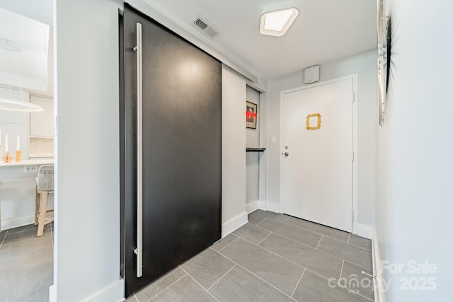 interior space featuring tile patterned flooring