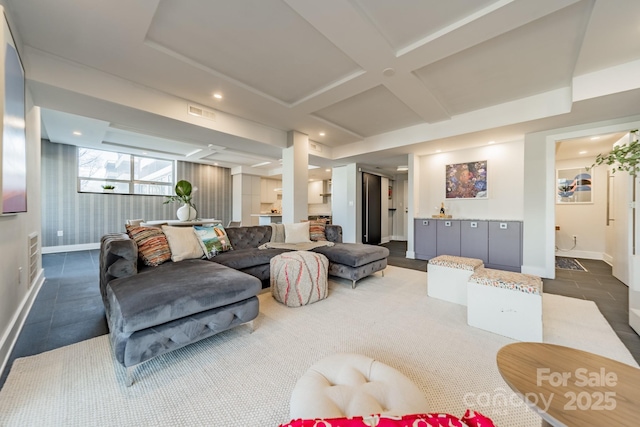 living room featuring beamed ceiling and coffered ceiling