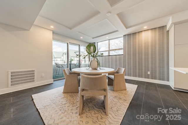 dining space with beamed ceiling and coffered ceiling