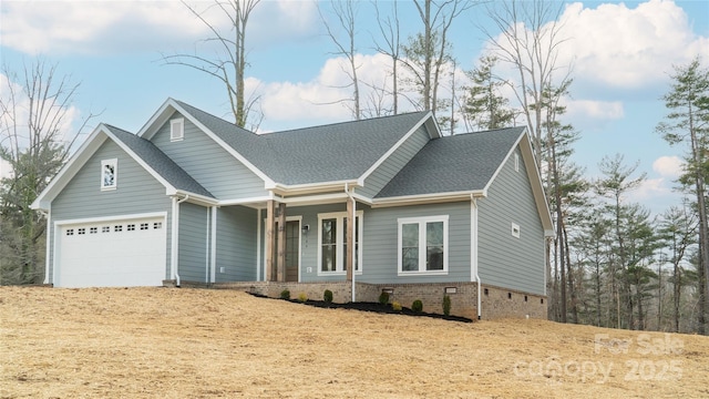 view of front of property featuring a garage