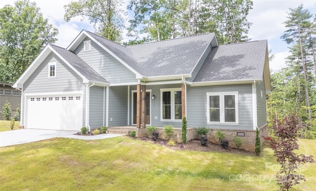 126 Maehill Pl SW, Lenoir, NC 28645 - view of front of house featuring covered porch, a front lawn, concrete driveway, an attached garage, and roof with shingles