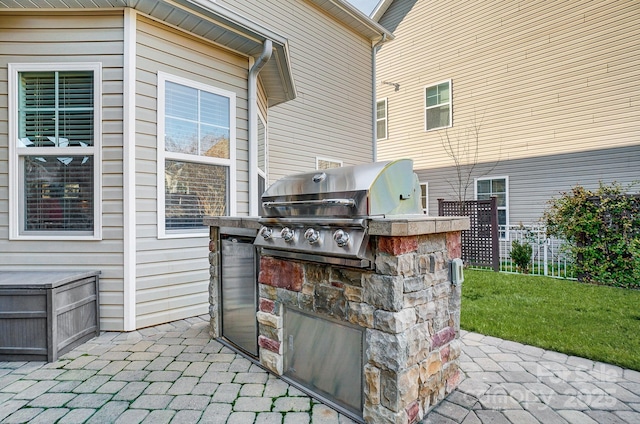 view of patio featuring a grill and exterior kitchen