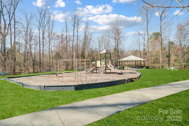 community play area featuring a lawn