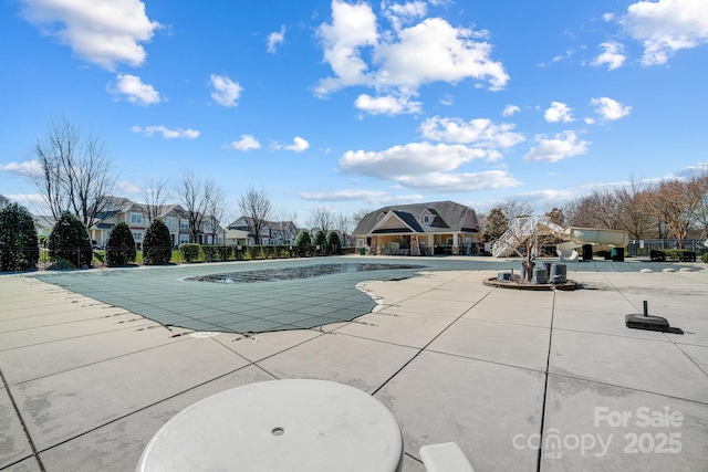 community pool featuring a patio