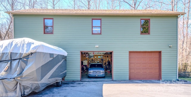 view of front of home with a garage