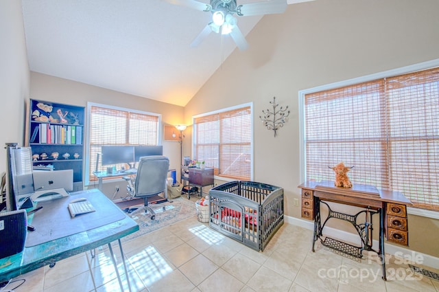 office area featuring ceiling fan, light tile patterned floors, and high vaulted ceiling