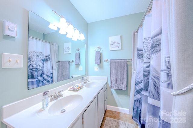 bathroom with vanity, tile patterned flooring, and a shower with shower curtain