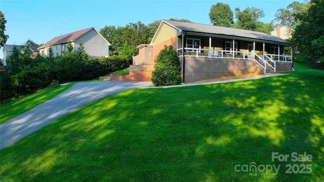 6108 Gold Creek Estate Dr, Hickory, NC 28601 - view of front of home featuring covered porch, a front lawn, and stairway