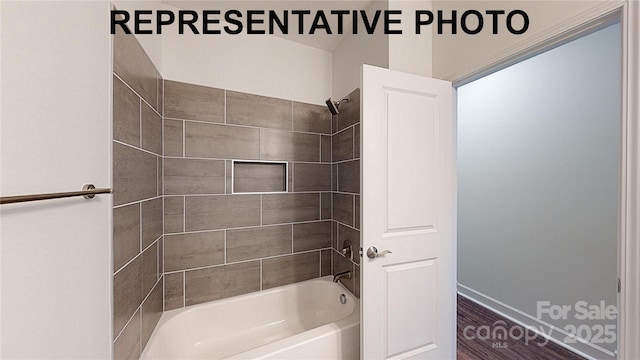 full bath featuring washtub / shower combination